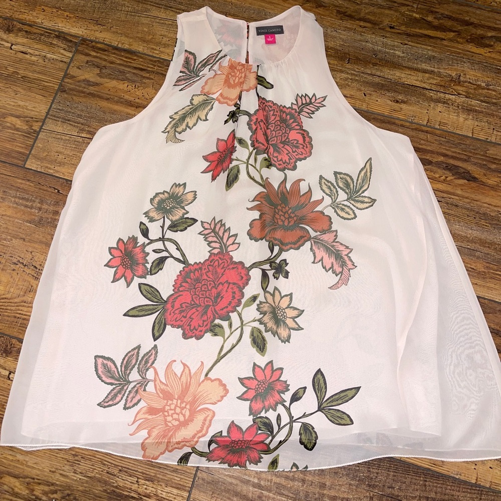 Light pink and floral sleeveless blouse